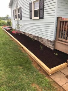 Landscape design and build including planting, hardscape installation, mulch and more.
