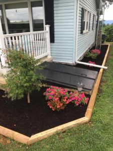 Professional lawn care and landscape maintenance of living outdoor yard-scapes including watering, weeding, mulching in Shippensburg, Chambersburg, Carlisle PA. 